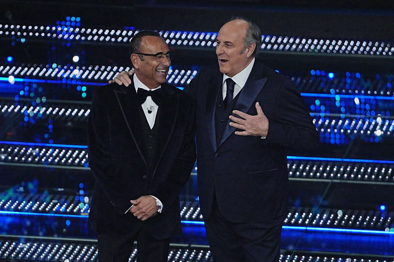 Festival di Sanremo 2025: Carlo Conti, la sfida del ritorno tra emozioni e grandi ospiti come Gerry Scotti e Antonella Clerici