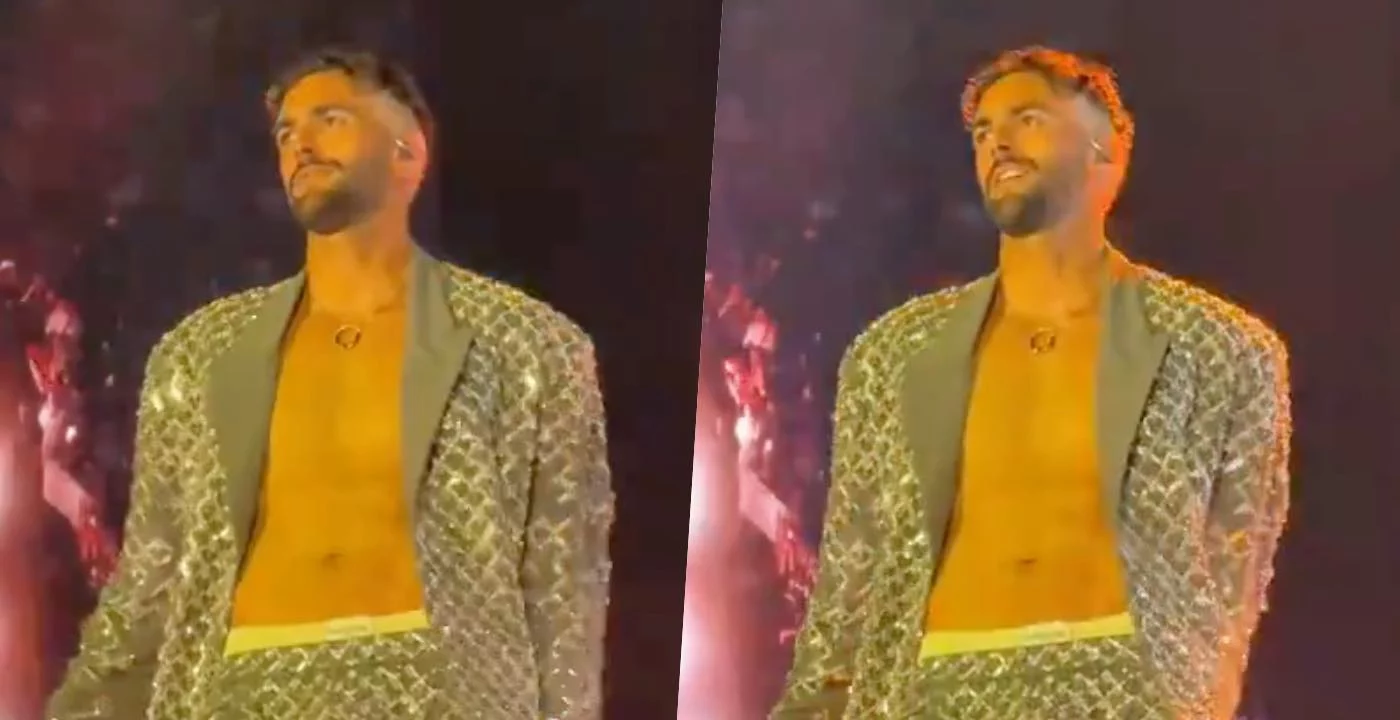 Marco Mengoni al centro di una polemica social per un cartellone di una fan durante il tour negli stadi
