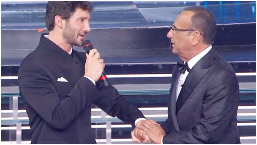 Carlo Conti cede il passo a Stefano De Martino a Sanremo: l’emozione dell’ex di Belen sul palco