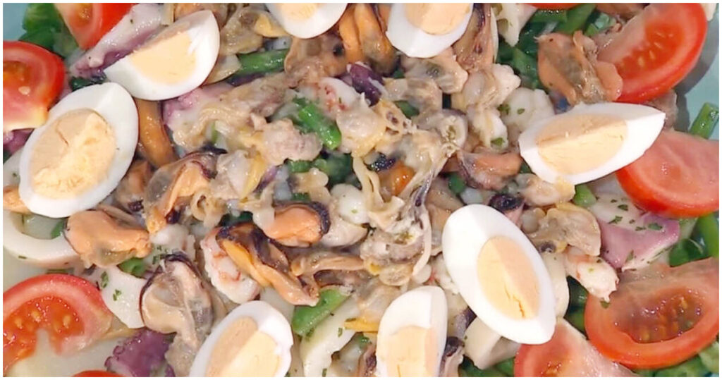 Scopri l’Insalata di mare alla nizzarda di Zia Cri: la ricetta estiva perfetta vista su È sempre mezzogiorno, preparata il 21 maggio 2026!